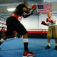 Parkinson’s patient Jim Coppula works out in the ring with boxing coach Justice Smith
